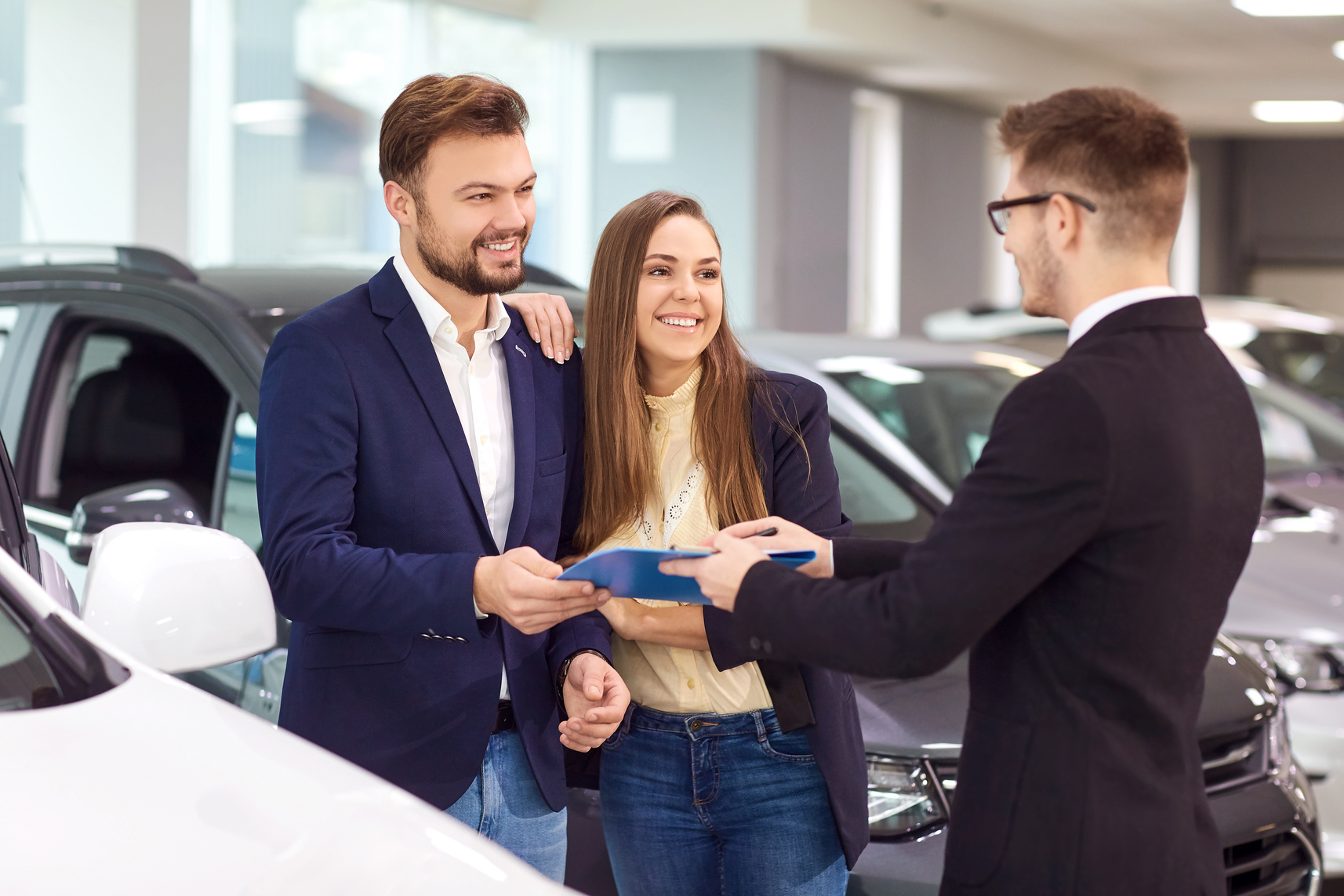 Sale, Rental Cars. a Car Dealer Sells Cars to Customers.